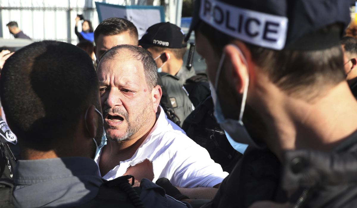 Video shows Israeli police beating lawmaker at
protest 1