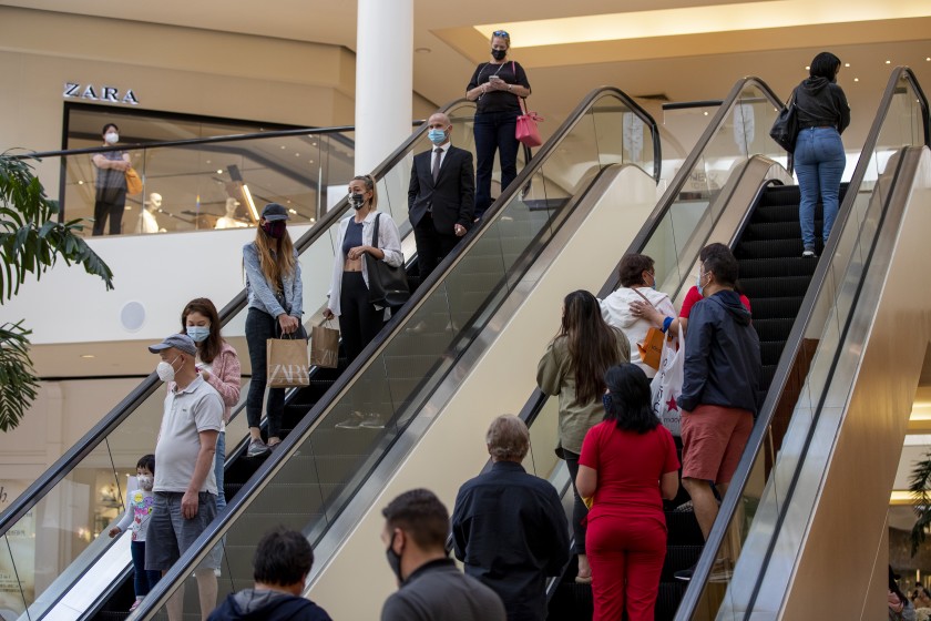 Many experts say to keep masks on, as pushback to CDC ruling
intensifies 1