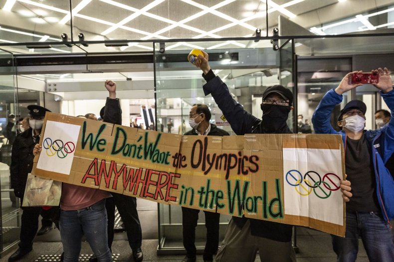 Dozens Protest to Cancel Olympics in Tokyo as COVID
Hospitalizations Approach Record High 1