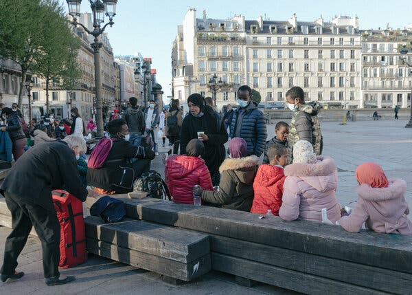 With Official Housing Scant, French People Open Their Homes
to Migrants 1