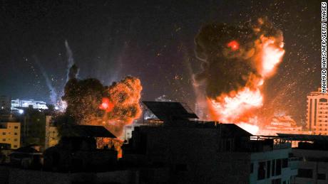 Israeli jets pound Gaza as rocket fire resumes and
Palestinians hit streets to protest 1