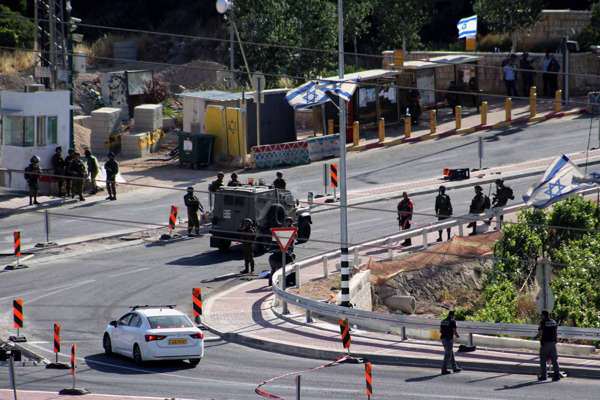 Palestinian woman killed by Israeli soldiers after opening
fire in West Bank: report 1
