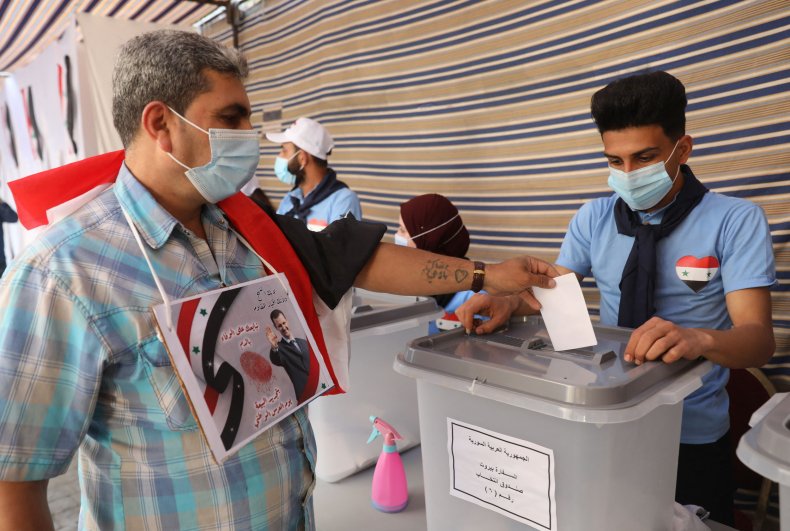 Lebanese Protesters Call for Syrian Refugees to Return Home
as They Cast Election Ballots 1
