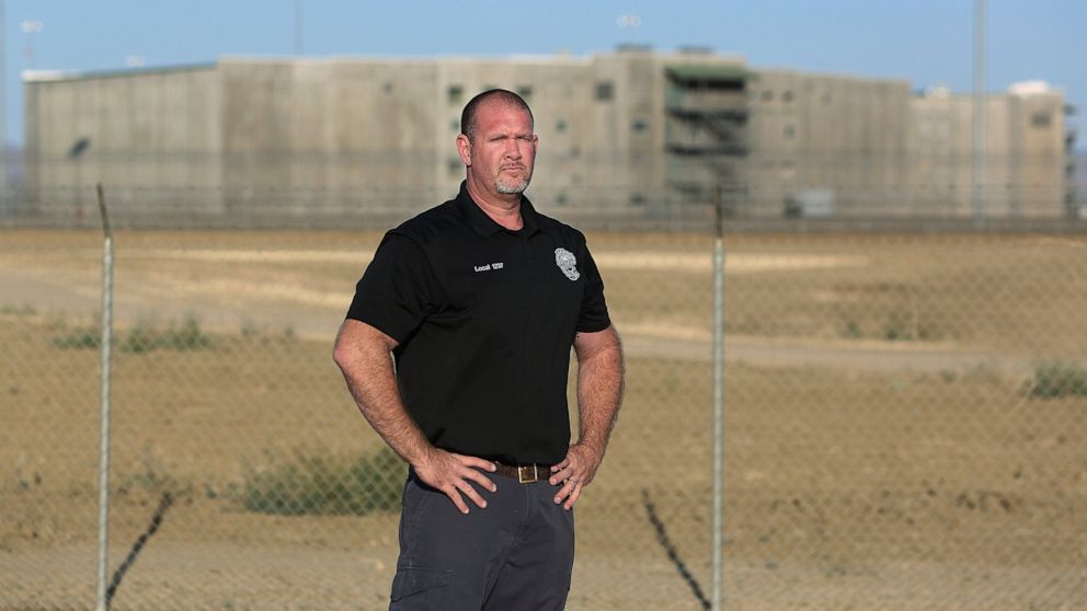 Cooks, nurses guard inmates with US prisons down 6K
officers 1
