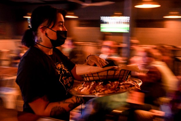 Sports bars embrace relaxed masking and full capacity just
in time for Avalanche, Nuggets postseason: “When is the last time
you hi-fived a stranger?” 1