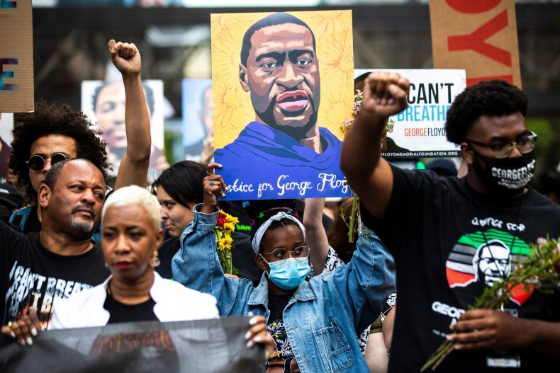 On Anniversary Of George Floyd's Murder, Activists Push to
Divest Police Funding 1