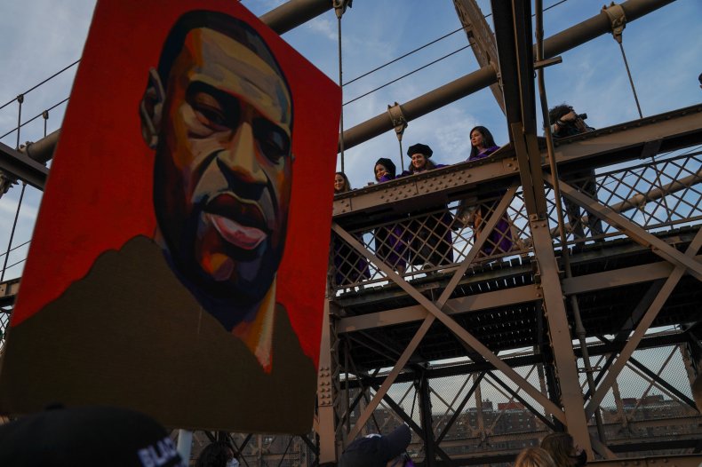 Police Car Knocks Down Man on Bike During George Floyd
Anniversary Protest 1