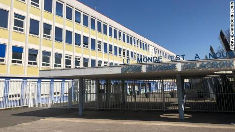 France kept classrooms open 'at all costs.' At a school
where 20 pupils lost loved ones, some say the price was too
high 1