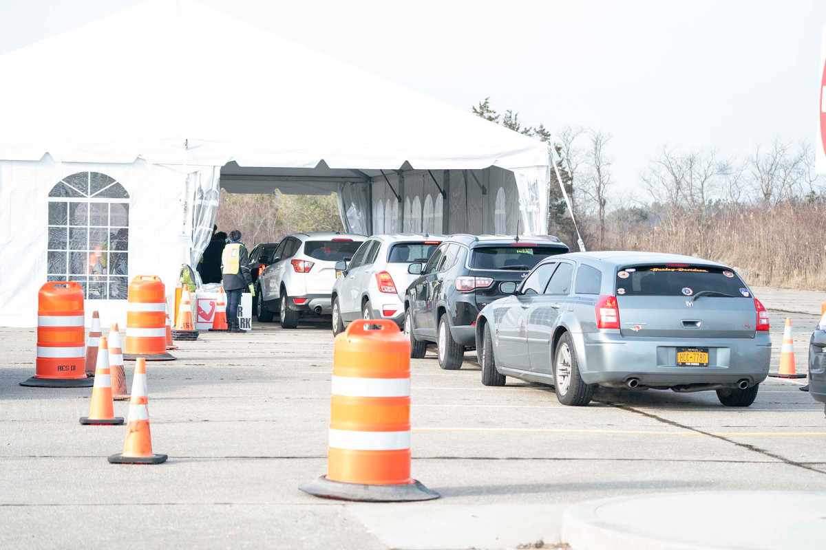 Tennessee woman sped through vaccine tent in protest, cops
say 1