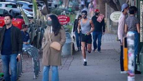 Why some vaccinated people won't go maskless -- even
outdoors 1