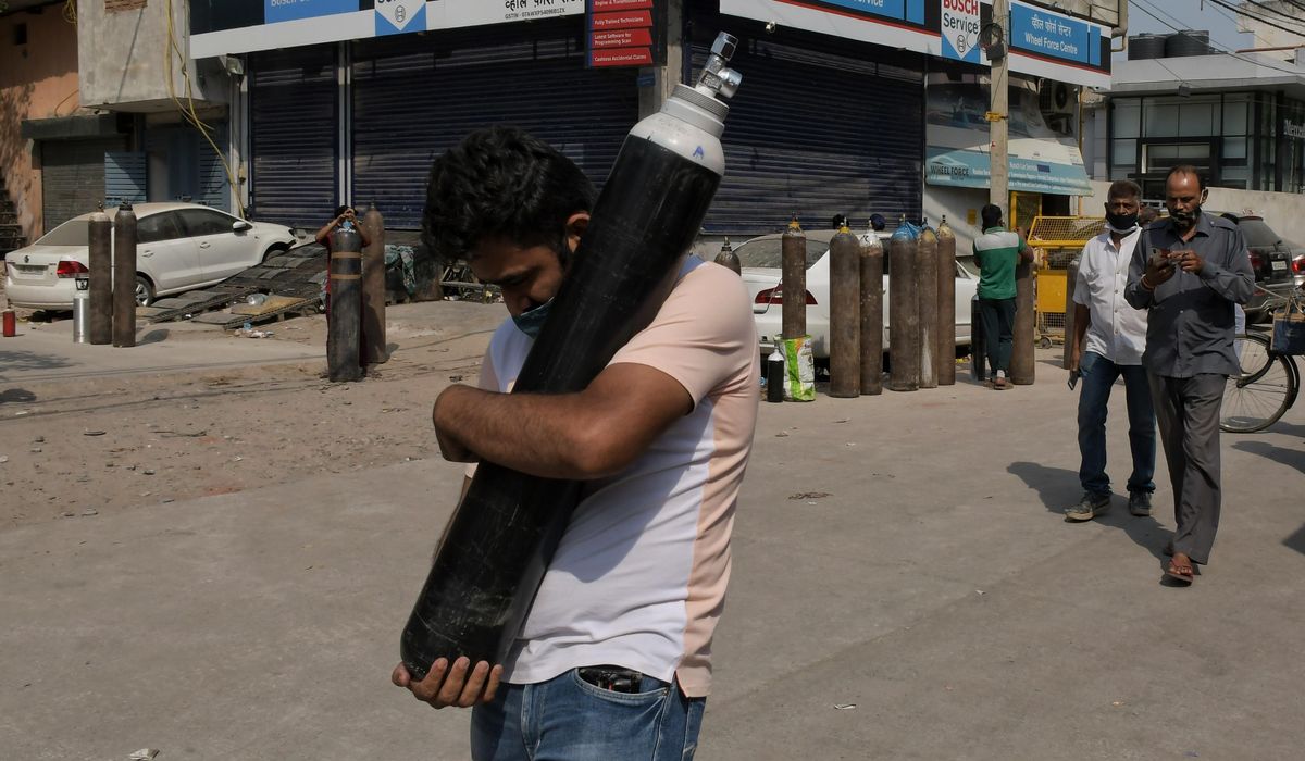 Indian government faces lockdown calls, contempt
charges 1