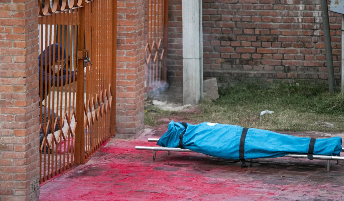 The Latest: Nepal extends lockdown for capital amid
surge 1