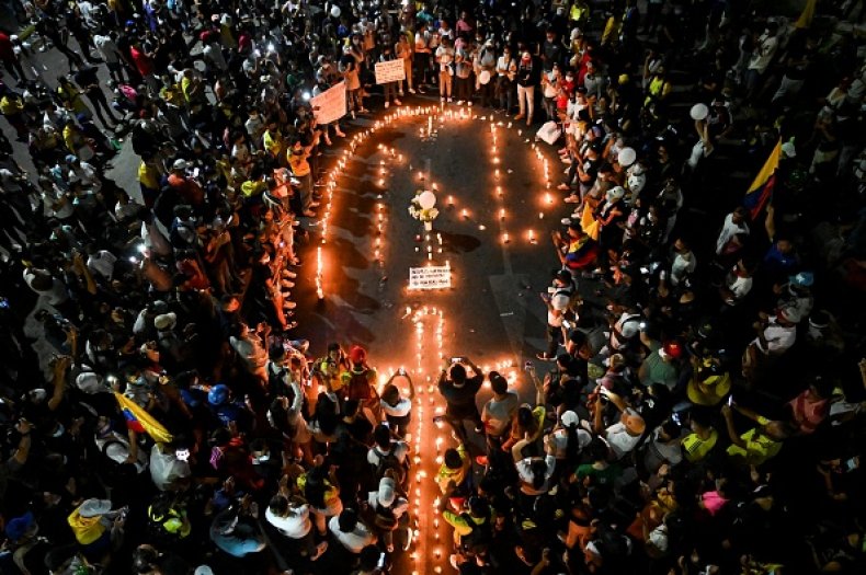 Video Shows Colombian Woman Screaming for Police to Kill Her
After Her Only Son Was Killed in Protests 1