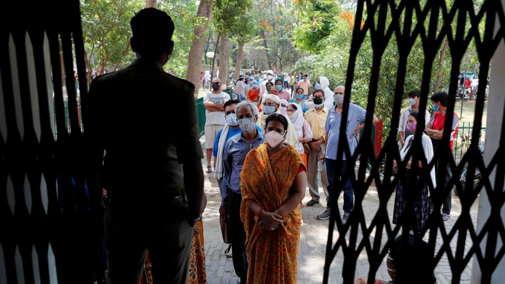 India's surge hits southern states, prompts more
lockdowns 1