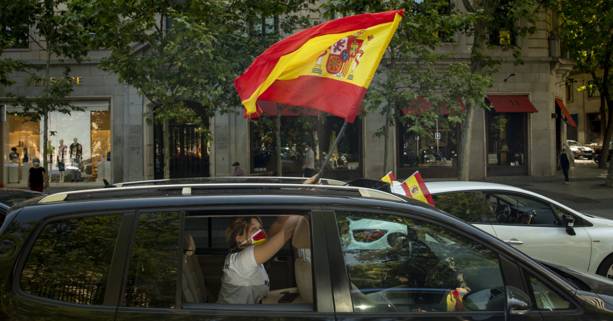 Spain rings in end of coronavirus limits with boisterous
street parties 1