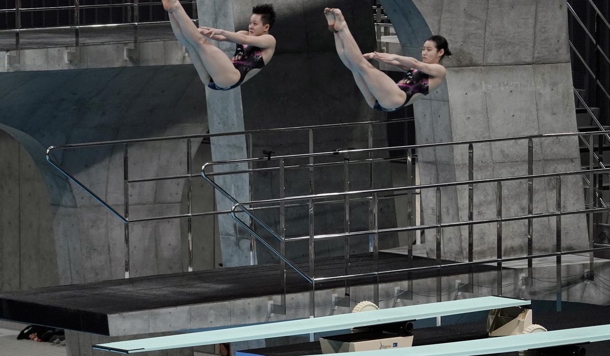 Olympic torch relay detour; diving test event opens in
Tokyo 1