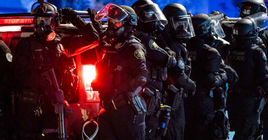 50 Police Officers Step Down From a Crowd Control Unit in
Portland 1