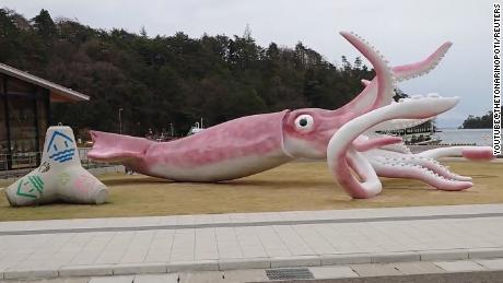 Giant Buddhist goddess in Japan gets face mask to pray for
end of Covid-19 1