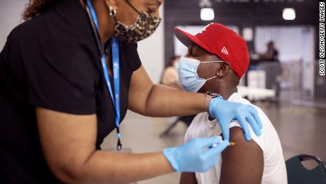 The US marks a vaccine milestone, but one expert warns that
the coronavirus Delta variant has a worrying impact on
patients 1