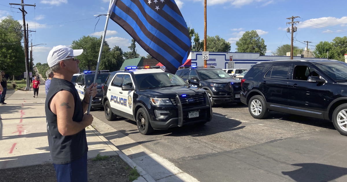 Colorado man who intervened after ambush on officer was
fatally shot by police 1