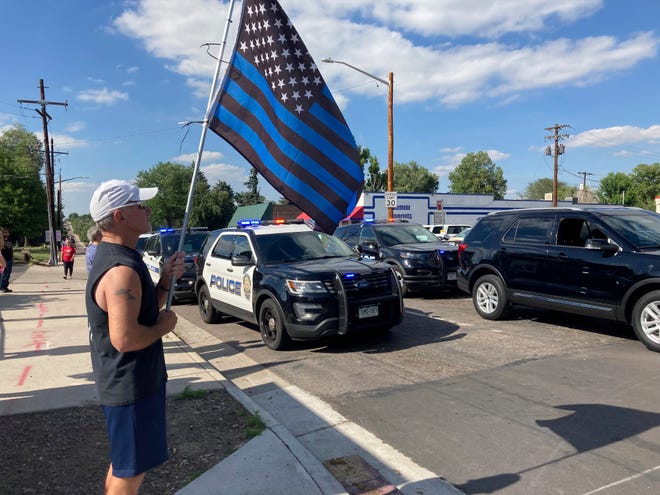 3 killed in Denver-area shooting, including a police officer
and suspect, authorities say 1