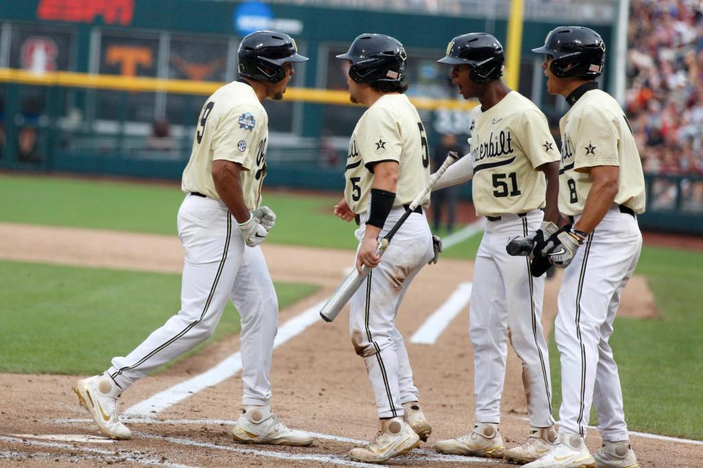 College World Series: Big 1st inning sends Vanderbilt past
Mississippi State 2 in finals opener 1