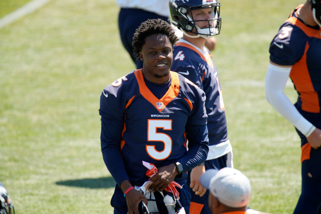 “Somehow, someway,” quarterback snaps will be 50-50 when
Broncos open training camp next month 1