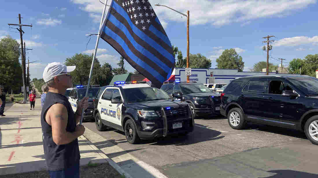 Police Officer And Another Person Were Killed In Denver-Area
Shooting 1