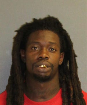 Man suspected of shooting Florida police officer captured in
a Georgia treehouse after days-long search 1
