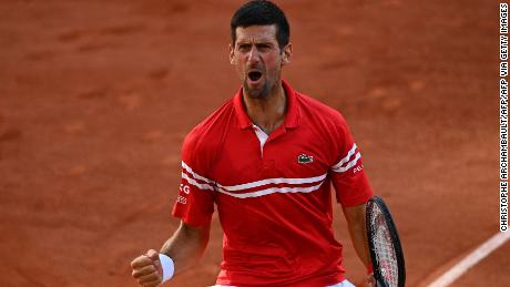 Novak Djokovic comes from two sets down to beat Stefanos
Tsitsipas in thrilling French Open final 1