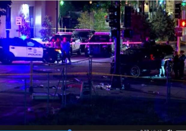 SUV rams into protesters, killing one and injuring
another 1