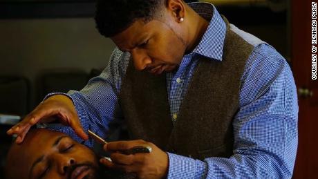 Health officials turn to Black-owned barber shops and hair
salons as possible Covid-19 vaccination sites 1