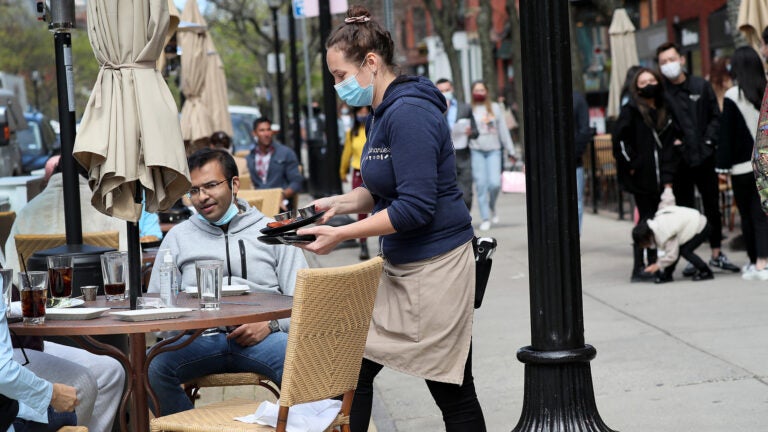 'Bear with us': As restaurants fully reopen, a new reality
sets in 1 'Bear with us': As restaurants fully reopen, a new reality
sets in 1