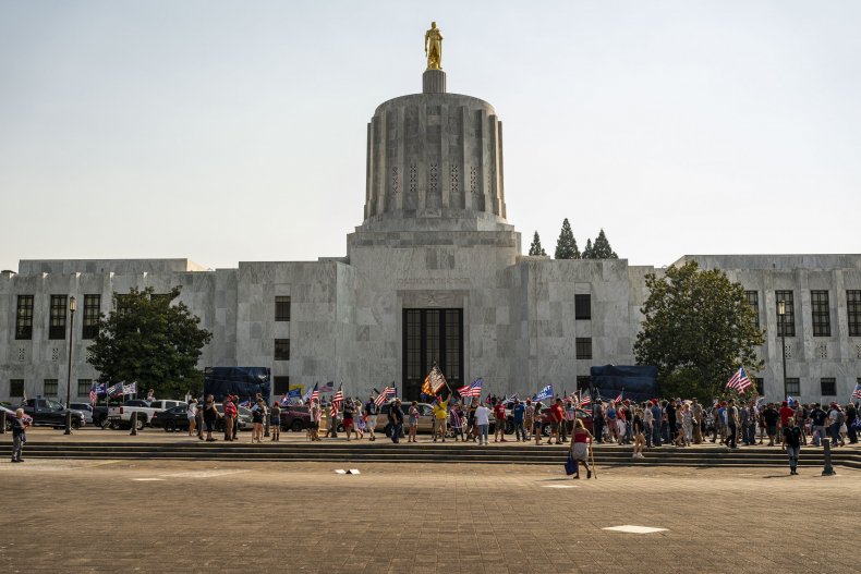Calls to Fire GOP Lawmaker Grow After Video Shows Him Hint
at Opening Oregon Capitol Door to Protesters 1