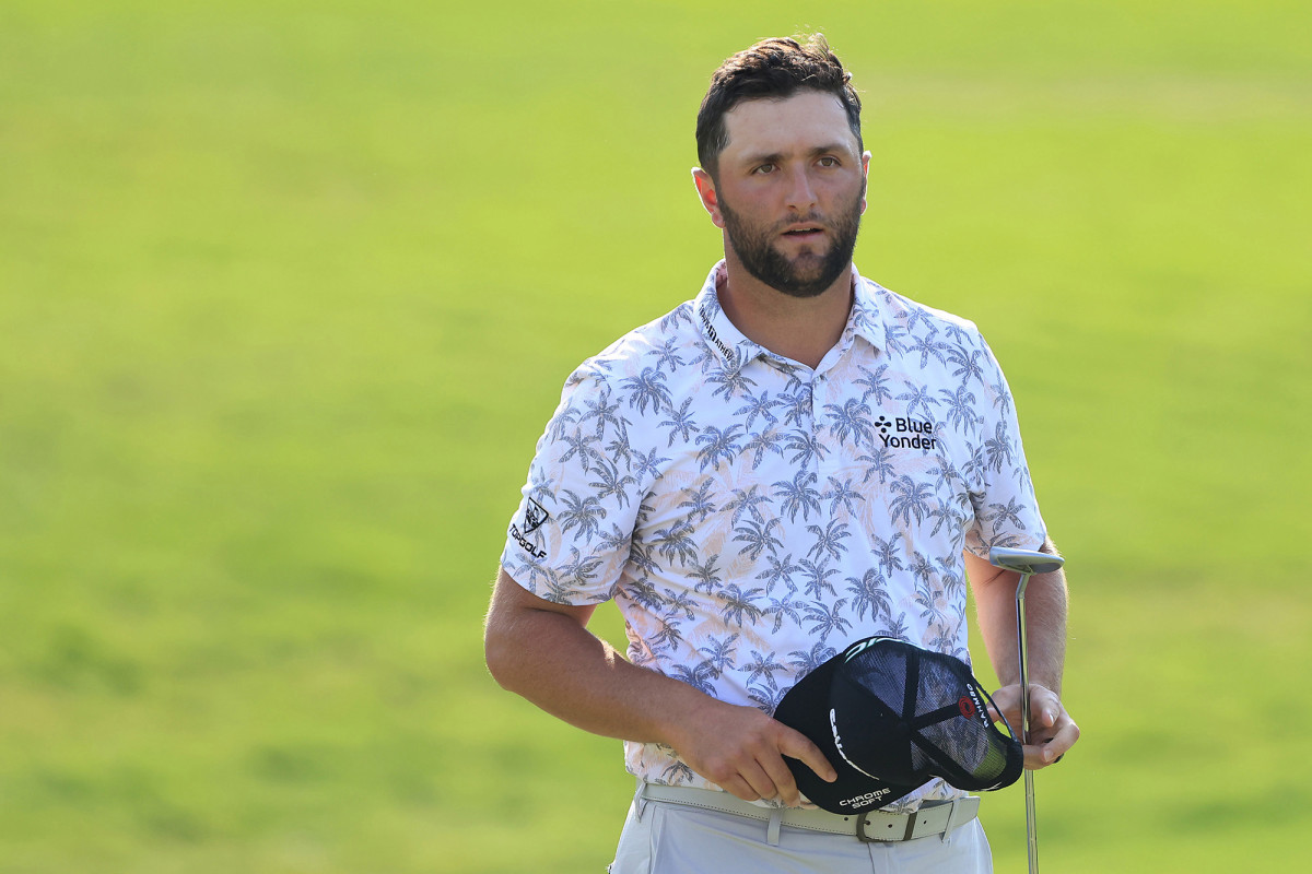 Jon Rahm withdraws with Memorial lead after testing positive
for COVID-19 1