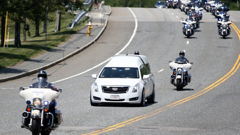 Procession honors officer who drowned trying to save
teen 1