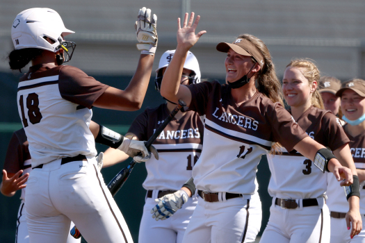 CCS softball roundup: St. Francis rides long ball into Open
final; Westmont mercy rules its way into Division-I title
game 1