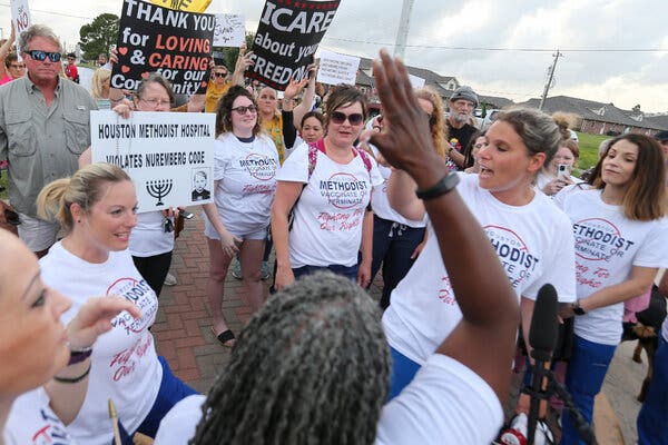 Texas Hospital’s Covid Vaccine Mandate Prompts Worker
Protest 1