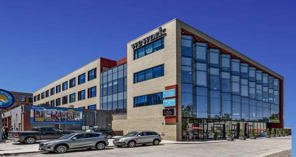 WeWork reopens one of four Denver locations it closed in
February 1