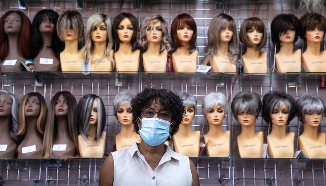 Arizona business that sells wigs to people undergoing cancer
treatment targeted by anti-mask group 1