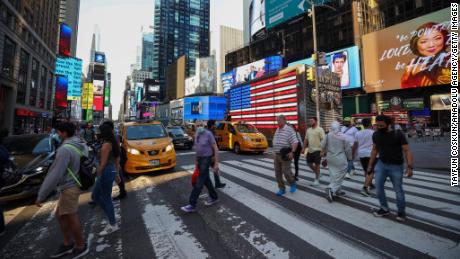 US reports lowest average of daily Covid-19 infections and
deaths since March 2020. But experts warn millions are still
vulnerable 1