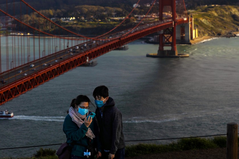 Californians vaccinated for COVID-19 can largely shed masks
on June 15 1