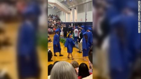 Critics say schools policed 'Black joy' and ethnic pride
when graduates were blocked from crossing stages 1