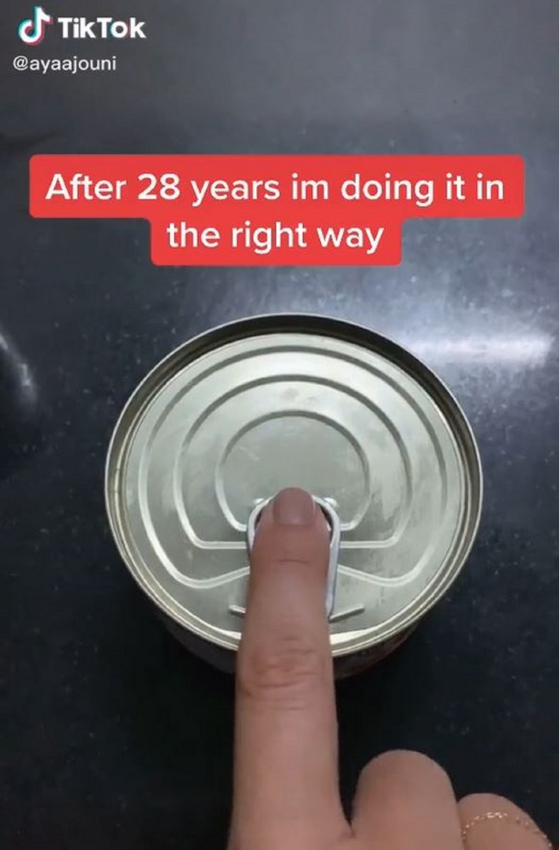 Woman Reckons We've Been Opening Cans Wrong As She Shares
'Right' Way 1