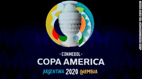 Brazil's Bolsonaro says he regrets Covid-19 deaths, but aims
to host Copa America 1