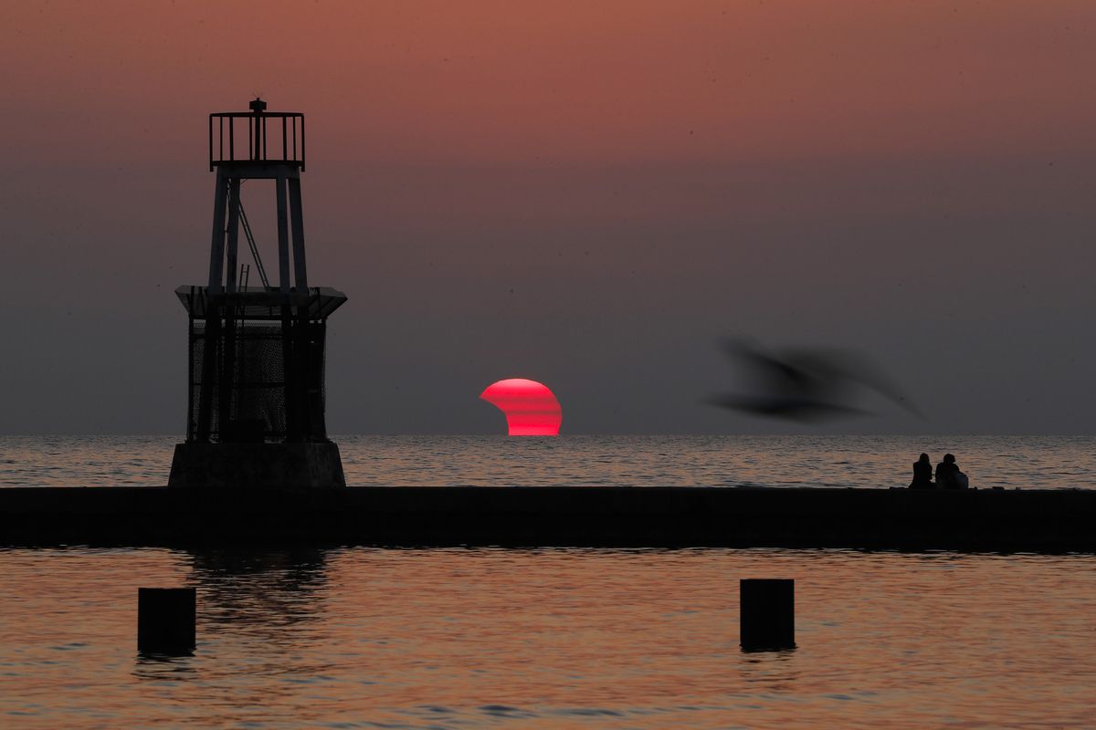 ‘A happy celestial coincidence.’ Chicagoans experience
partial eclipse as Adler Planetarium announces partial
reopening 1 ‘A happy celestial coincidence.’ Chicagoans experience
partial eclipse as Adler Planetarium announces partial
reopening 1