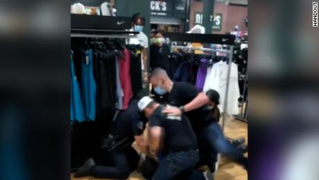 4 police officers in California are on leave after video
shows a suspect being punched and kicked during an arrest 1