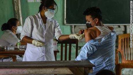 Vaccinations remain our best fight against Covid-19, which
could surge again in the winter, expert warns 1