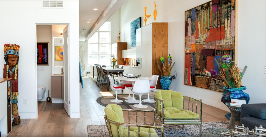 A showcase for art in a RiNo townhouse/loft shows a trendy
restaurant district reopening 1