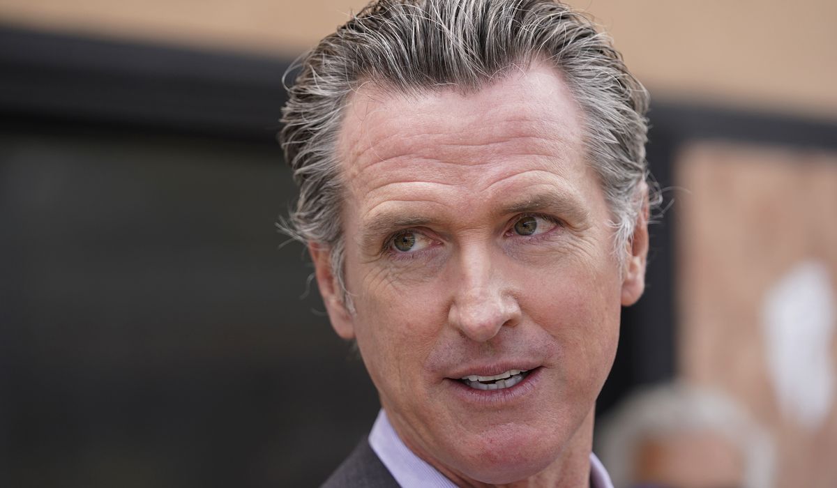 Gavin Newsom signs executive order to roll back California
coronavirus restrictions 1